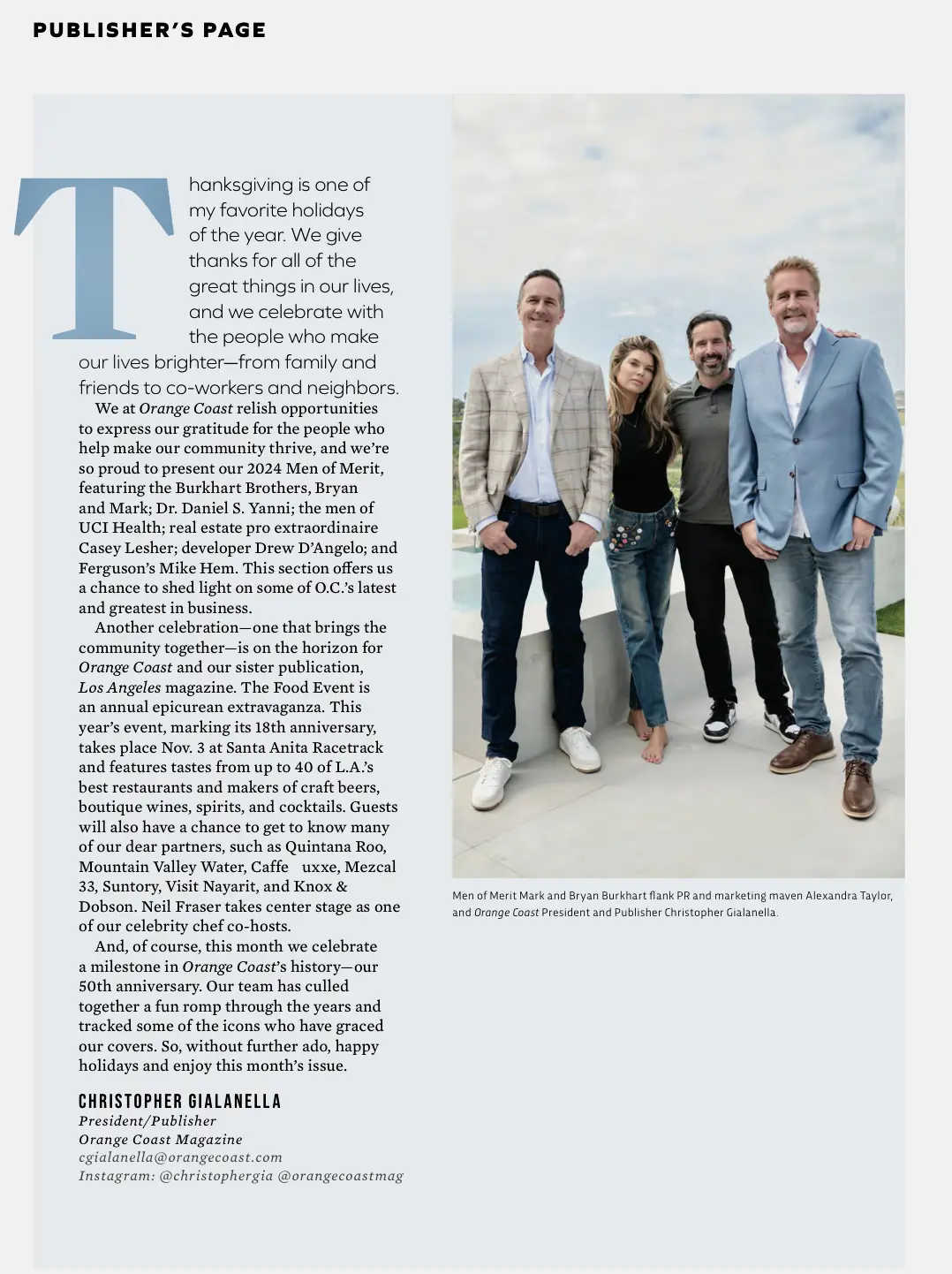 Magazine article showing an image of 4 people standing next to each other outside